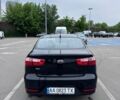 Чорний Кіа Ріо, об'ємом двигуна 1.4 л та пробігом 168 тис. км за 10000 $, фото 5 на Automoto.ua