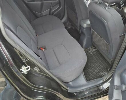 Черный Киа Рио, объемом двигателя 1.4 л и пробегом 115 тыс. км за 9400 $, фото 5 на Automoto.ua