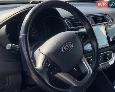 Чорний Кіа Ріо, об'ємом двигуна 1.4 л та пробігом 80 тис. км за 12300 $, фото 15 на Automoto.ua