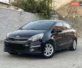 Черный Киа Рио, объемом двигателя 1.4 л и пробегом 95 тыс. км за 8999 $, фото 1 на Automoto.ua