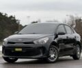 Черный Киа Рио, объемом двигателя 1.6 л и пробегом 135 тыс. км за 9800 $, фото 1 на Automoto.ua