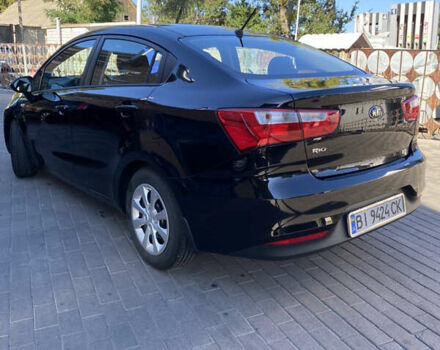 Чорний Кіа Ріо, об'ємом двигуна 1.4 л та пробігом 14 тис. км за 11999 $, фото 3 на Automoto.ua