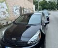 Черный Киа Рио, объемом двигателя 1.6 л и пробегом 70 тыс. км за 9000 $, фото 1 на Automoto.ua