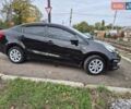 Черный Киа Рио, объемом двигателя 1.4 л и пробегом 115 тыс. км за 9500 $, фото 13 на Automoto.ua