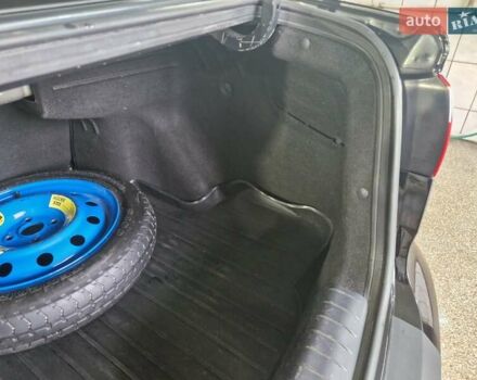 Черный Киа Рио, объемом двигателя 1.4 л и пробегом 96 тыс. км за 9500 $, фото 19 на Automoto.ua