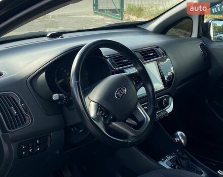 Чорний Кіа Ріо, об'ємом двигуна 1.4 л та пробігом 80 тис. км за 12300 $, фото 20 на Automoto.ua