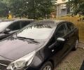 Чорний Кіа Ріо, об'ємом двигуна 1.4 л та пробігом 79 тис. км за 11500 $, фото 4 на Automoto.ua
