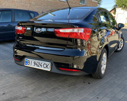 Чорний Кіа Ріо, об'ємом двигуна 1.4 л та пробігом 14 тис. км за 11999 $, фото 2 на Automoto.ua