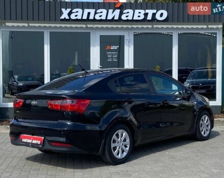 Чорний Кіа Ріо, об'ємом двигуна 1.4 л та пробігом 80 тис. км за 12300 $, фото 1 на Automoto.ua