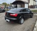 Черный Киа Рио, объемом двигателя 1.4 л и пробегом 115 тыс. км за 9400 $, фото 3 на Automoto.ua
