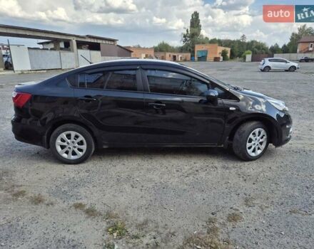 Черный Киа Рио, объемом двигателя 1.4 л и пробегом 115 тыс. км за 9400 $, фото 1 на Automoto.ua