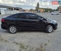 Черный Киа Рио, объемом двигателя 1.4 л и пробегом 115 тыс. км за 9500 $, фото 1 на Automoto.ua