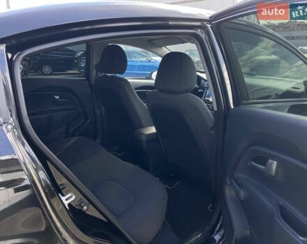 Чорний Кіа Ріо, об'ємом двигуна 1.4 л та пробігом 80 тис. км за 12300 $, фото 5 на Automoto.ua