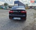 Черный Киа Рио, объемом двигателя 1.4 л и пробегом 115 тыс. км за 9500 $, фото 17 на Automoto.ua