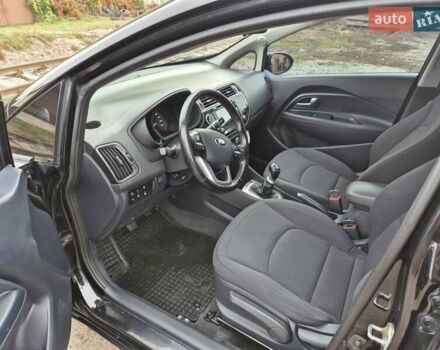 Черный Киа Рио, объемом двигателя 1.4 л и пробегом 115 тыс. км за 9400 $, фото 7 на Automoto.ua