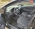 Черный Киа Рио, объемом двигателя 1.4 л и пробегом 115 тыс. км за 9500 $, фото 7 на Automoto.ua
