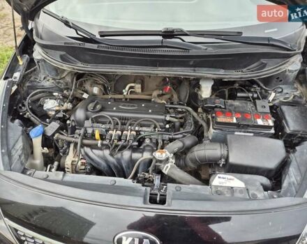 Черный Киа Рио, объемом двигателя 1.4 л и пробегом 115 тыс. км за 9400 $, фото 14 на Automoto.ua