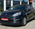 Чорний Кіа Ріо, об'ємом двигуна 1.4 л та пробігом 80 тис. км за 12300 $, фото 25 на Automoto.ua
