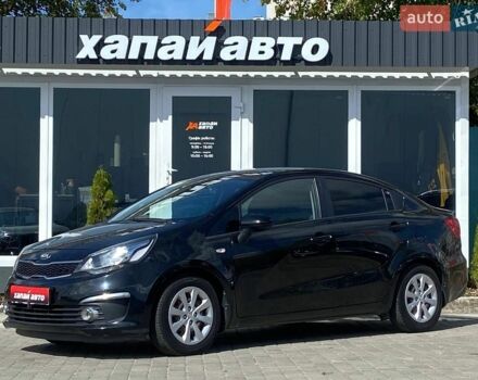 Чорний Кіа Ріо, об'ємом двигуна 1.4 л та пробігом 80 тис. км за 12300 $, фото 27 на Automoto.ua
