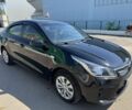 Чорний Кіа Ріо, об'ємом двигуна 1 л та пробігом 156 тис. км за 11028 $, фото 5 на Automoto.ua