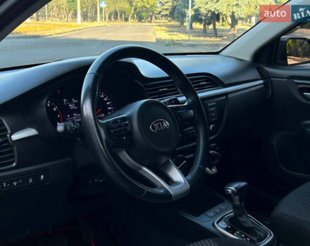 Чорний Кіа Ріо, об'ємом двигуна 1.37 л та пробігом 127 тис. км за 11899 $, фото 13 на Automoto.ua