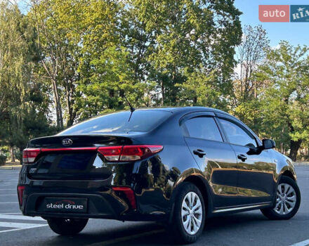 Чорний Кіа Ріо, об'ємом двигуна 1.37 л та пробігом 127 тис. км за 11899 $, фото 1 на Automoto.ua