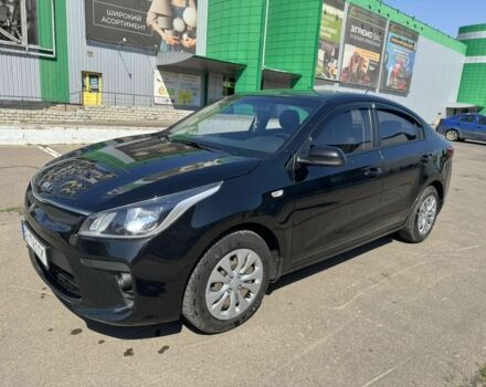 Чорний Кіа Ріо, об'ємом двигуна 1 л та пробігом 156 тис. км за 11028 $, фото 4 на Automoto.ua