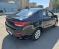 Чорний Кіа Ріо, об'ємом двигуна 1 л та пробігом 156 тис. км за 11028 $, фото 3 на Automoto.ua