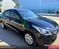 Чорний Кіа Ріо, об'ємом двигуна 1.4 л та пробігом 145 тис. км за 11500 $, фото 1 на Automoto.ua