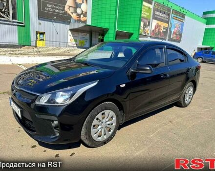 Чорний Кіа Ріо, об'ємом двигуна 1.4 л та пробігом 145 тис. км за 11500 $, фото 3 на Automoto.ua