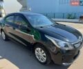 Черный Киа Рио, объемом двигателя 1.37 л и пробегом 150 тыс. км за 11500 $, фото 1 на Automoto.ua