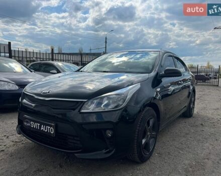 Черный Киа Рио, объемом двигателя 1.37 л и пробегом 145 тыс. км за 12500 $, фото 1 на Automoto.ua