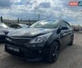 Черный Киа Рио, объемом двигателя 1.37 л и пробегом 145 тыс. км за 12500 $, фото 1 на Automoto.ua