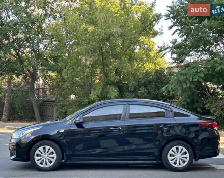 Чорний Кіа Ріо, об'ємом двигуна 1.37 л та пробігом 127 тис. км за 11899 $, фото 4 на Automoto.ua