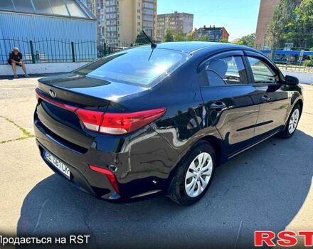 Чорний Кіа Ріо, об'ємом двигуна 1.4 л та пробігом 145 тис. км за 11500 $, фото 5 на Automoto.ua