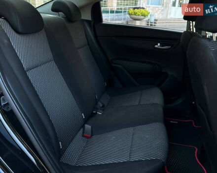 Чорний Кіа Ріо, об'ємом двигуна 1.37 л та пробігом 127 тис. км за 11899 $, фото 16 на Automoto.ua