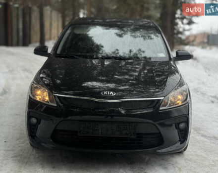 Чорний Кіа Ріо, об'ємом двигуна 1.4 л та пробігом 66 тис. км за 14200 $, фото 1 на Automoto.ua