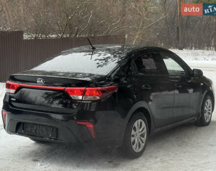 Чорний Кіа Ріо, об'ємом двигуна 1.4 л та пробігом 66 тис. км за 14200 $, фото 6 на Automoto.ua