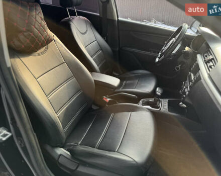 Чорний Кіа Ріо, об'ємом двигуна 1.37 л та пробігом 66 тис. км за 14500 $, фото 17 на Automoto.ua