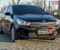 Чорний Кіа Ріо, об'ємом двигуна 1.6 л та пробігом 74 тис. км за 11790 $, фото 2 на Automoto.ua