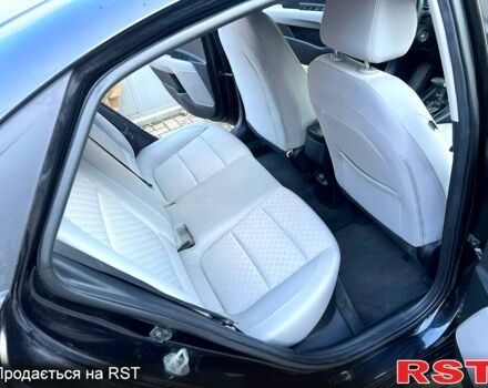 Черный Киа Рио, объемом двигателя 1.6 л и пробегом 10 тыс. км за 11500 $, фото 8 на Automoto.ua