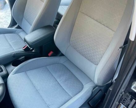 Чорний Кіа Ріо, об'ємом двигуна 1.6 л та пробігом 9 тис. км за 12700 $, фото 1 на Automoto.ua