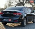 Чорний Кіа Ріо, об'ємом двигуна 1.6 л та пробігом 74 тис. км за 11790 $, фото 6 на Automoto.ua