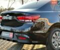 Чорний Кіа Ріо, об'ємом двигуна 1.6 л та пробігом 74 тис. км за 11790 $, фото 7 на Automoto.ua