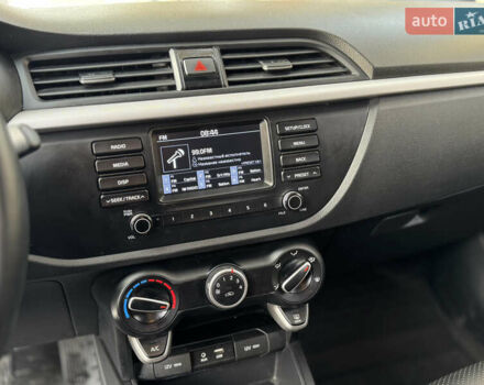 Чорний Кіа Ріо, об'ємом двигуна 1.37 л та пробігом 66 тис. км за 14300 $, фото 11 на Automoto.ua