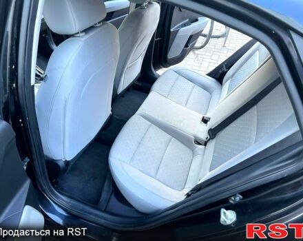 Черный Киа Рио, объемом двигателя 1.6 л и пробегом 10 тыс. км за 11500 $, фото 11 на Automoto.ua