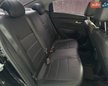 Чорний Кіа Ріо, об'ємом двигуна 1.4 л та пробігом 66 тис. км за 14200 $, фото 18 на Automoto.ua