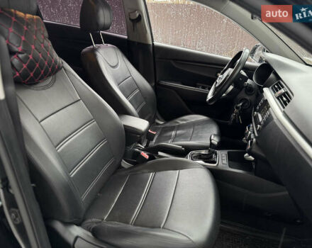 Чорний Кіа Ріо, об'ємом двигуна 1.4 л та пробігом 66 тис. км за 14200 $, фото 15 на Automoto.ua