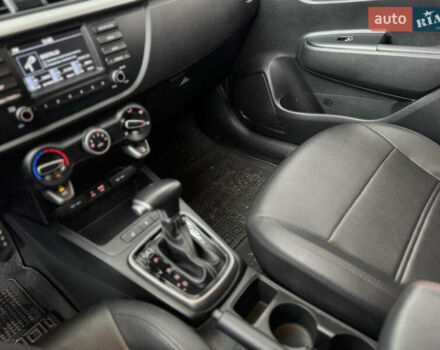 Чорний Кіа Ріо, об'ємом двигуна 1.4 л та пробігом 66 тис. км за 14200 $, фото 14 на Automoto.ua