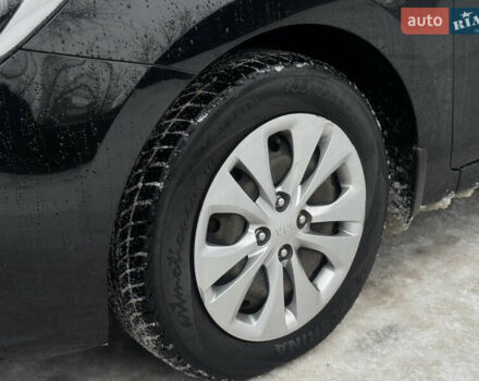 Чорний Кіа Ріо, об'ємом двигуна 1.4 л та пробігом 66 тис. км за 14200 $, фото 4 на Automoto.ua